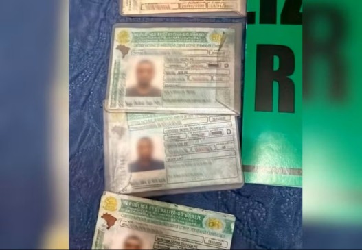 Documentos apreendidos com suspeito durante operação — Foto: SSP-TO/Divulgação