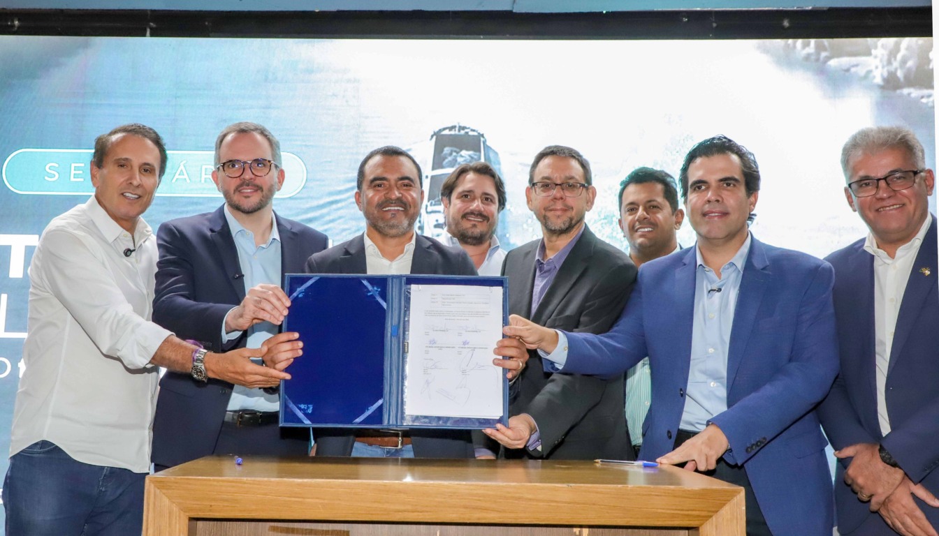 Governador Wanderlei Barbosa; ministro de Portos e Aeroportos, Silvio Costa Filho; secretário de Estado da Indústria, Comércio e Serviços, Milton Neris; presidente da VLI, Fábio Marchiori; e representantes da ETG Brasil participam do ato de assinatura que oficializou novos investimentos privados no Tocantins durante o Seminário Tocantins - Foto: Antonio Gonçalves/Governo do Tocantins Governador Wanderlei Barbosa; ministro de Portos e Aeroportos, Silvio Costa Filho; secretário de Estado da Indústria, Comércio e Serviços, Milton Neris; presidente da VLI, Fábio Marchiori; e representantes da ETG Brasil participam do ato de assinatura que oficializou novos investimentos privados no Tocantins durante o Seminário Tocantins - Foto: Antonio Gonçalves/Governo do Tocantins